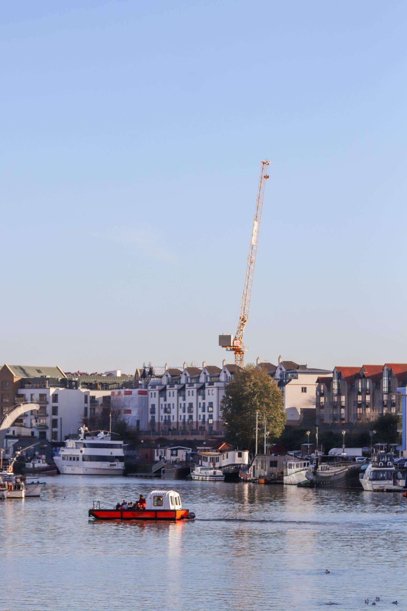 Boats and waterfront buildings around Bristol Harbour