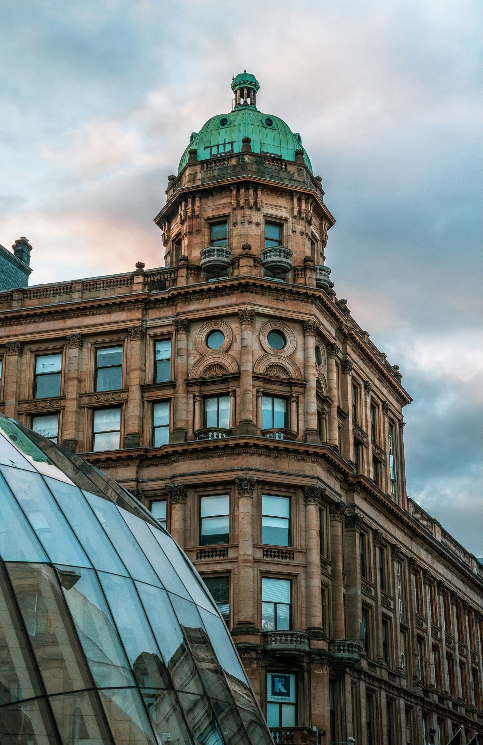 Historic domed sandstone building in central Glasgow