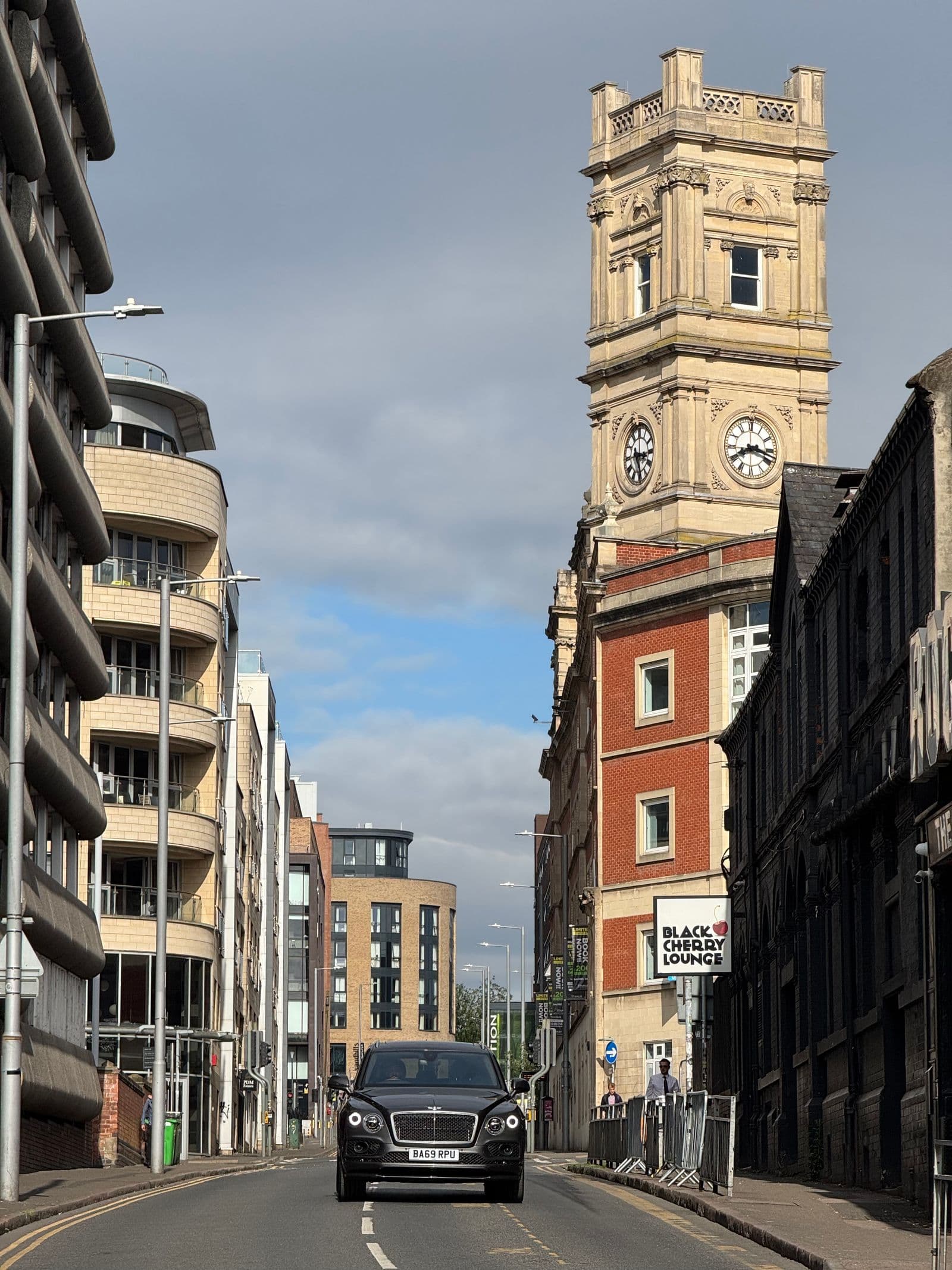 Clock tower and city street architecture in central Nottingham