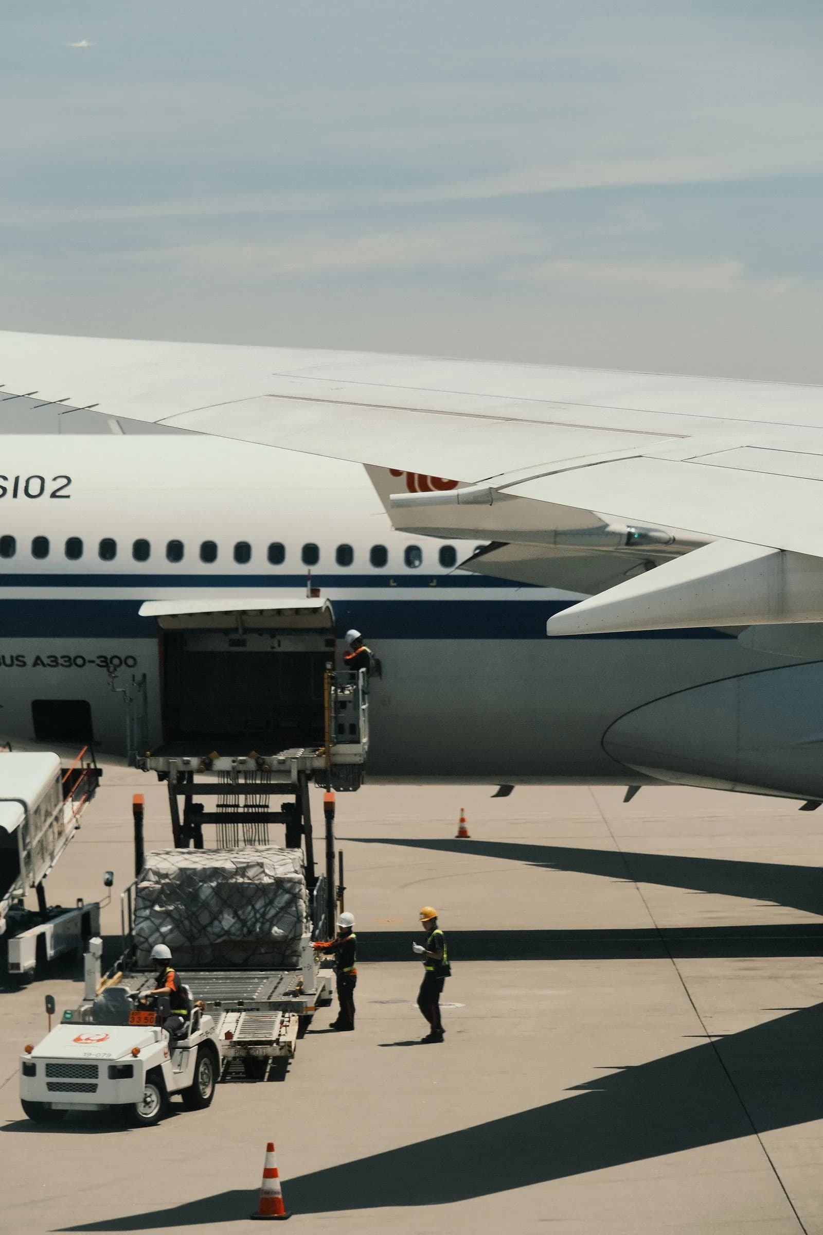 Air cargo being loaded onto an aircraft for time-critical AOG delivery