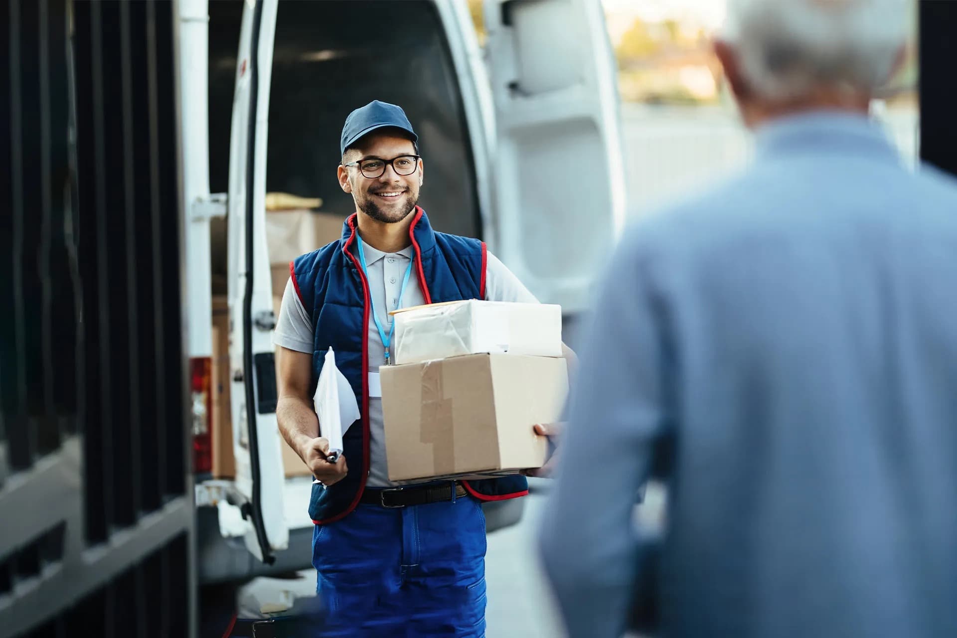 A dedicated courier handing a consignment directly to its recipient