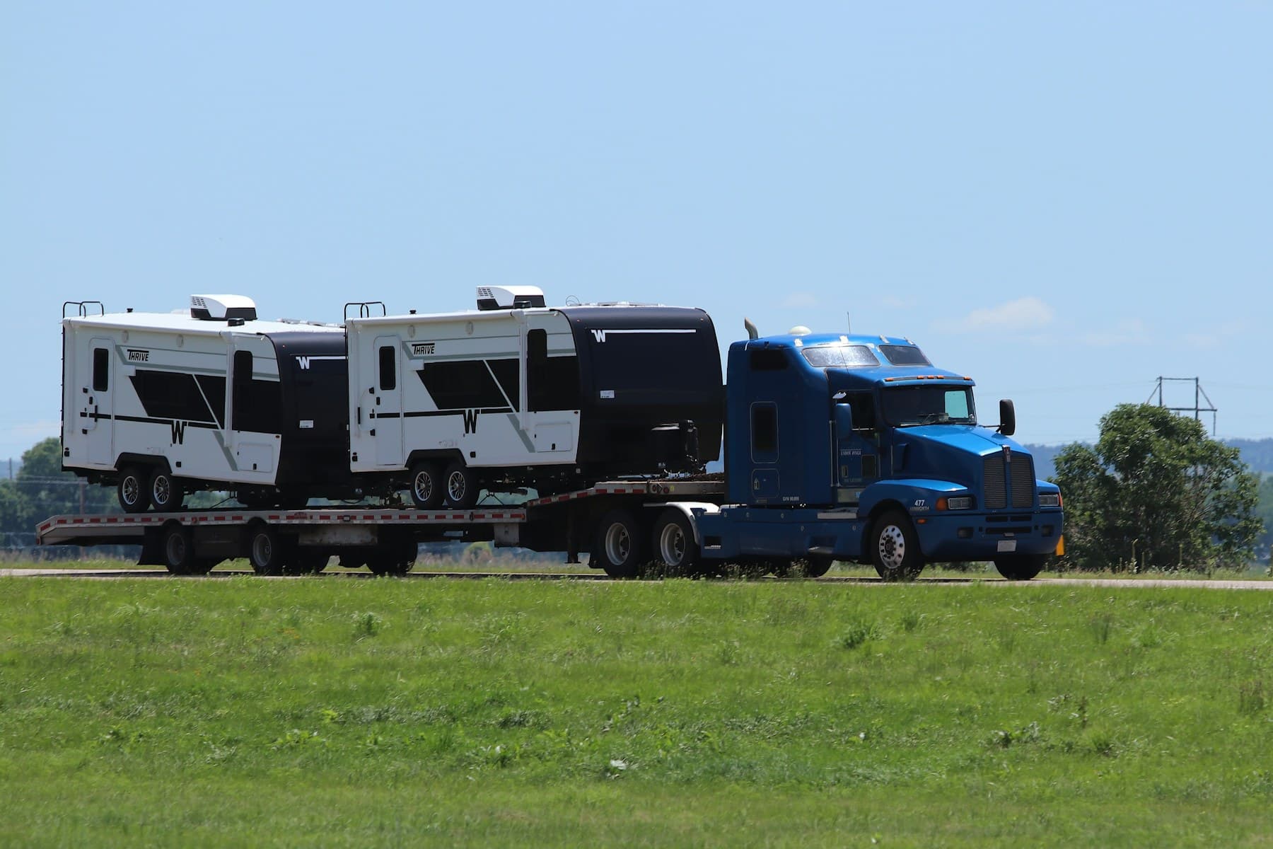 Flatbed vehicle carrying non-standard construction freight